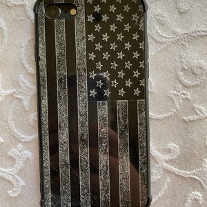 Gently used IPhone 8 black and white flag case.